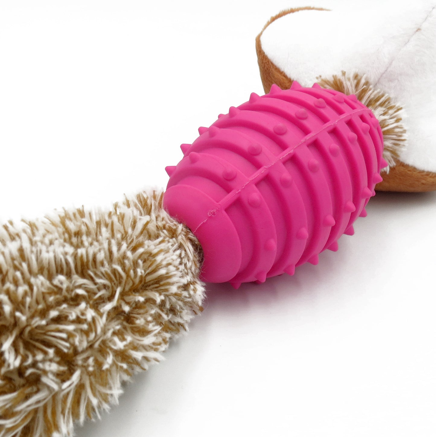 Soft toy for dogs with a teeth cleaning rubber ball