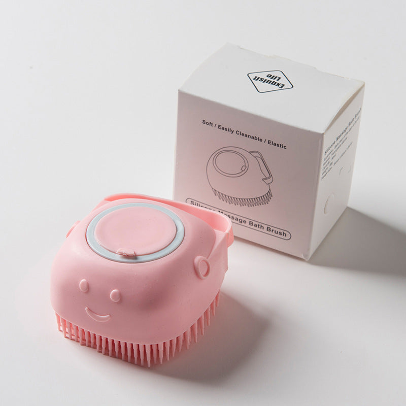 Massage brush with soap container