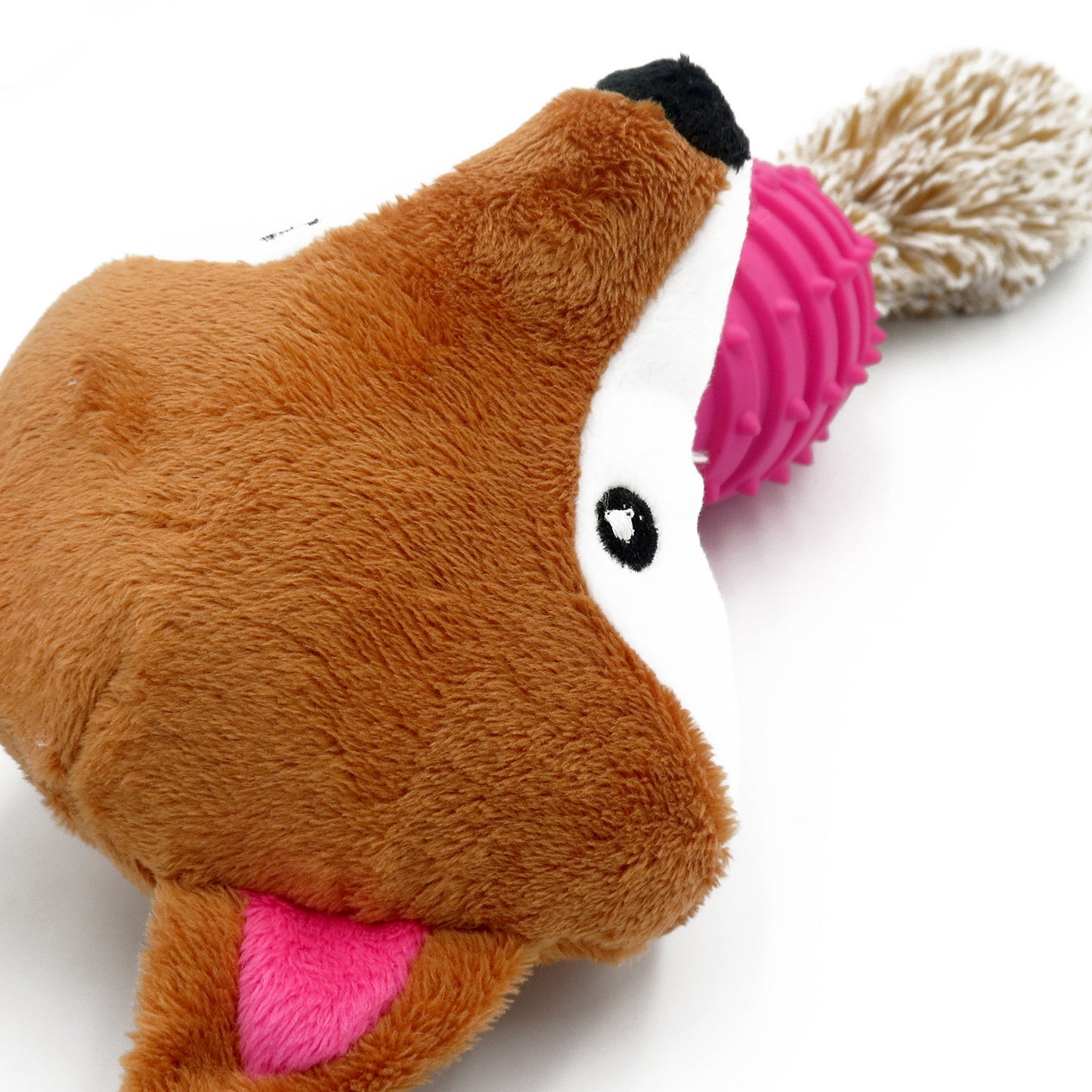 Soft toy for dogs with a teeth cleaning rubber ball