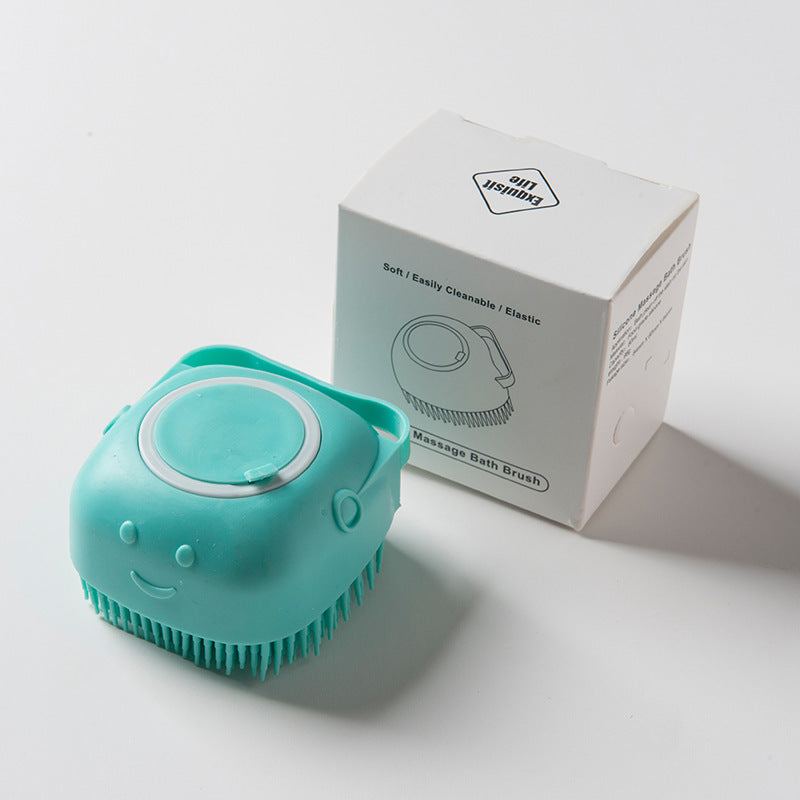 Massage brush with soap container