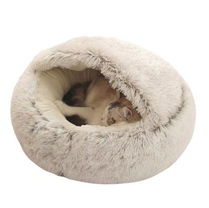 Soothing cat cave in soft plush