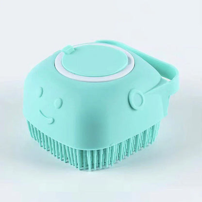 Massage brush with soap container