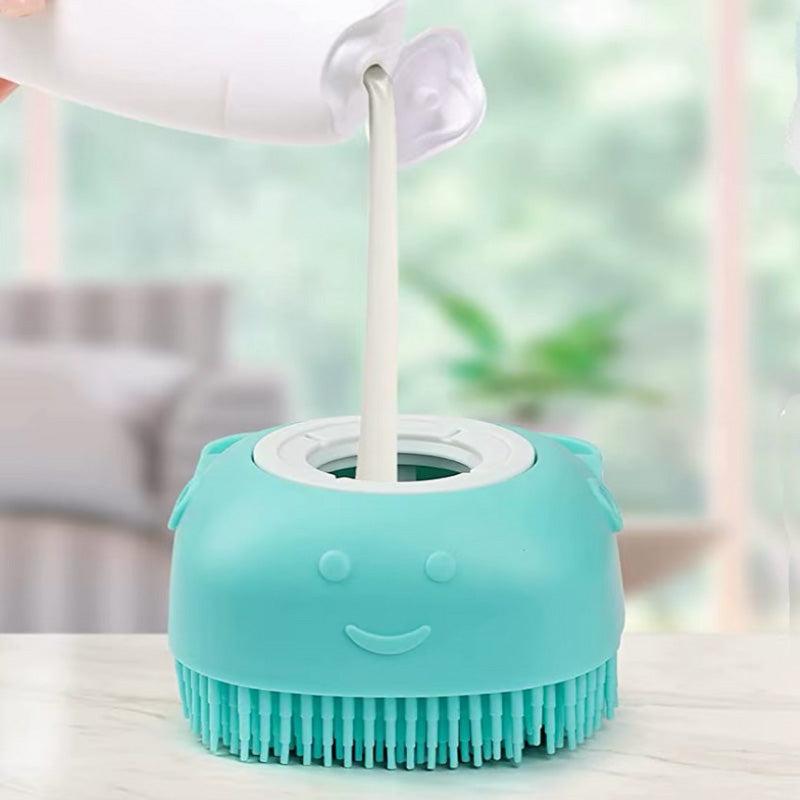 Massage brush with soap container